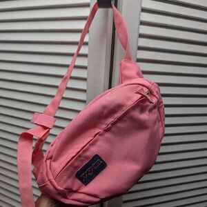 pink Jansport fanny pack